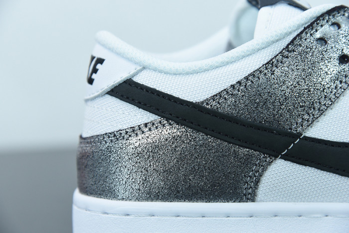 nike dunk low features silver cracked leather do5882-001