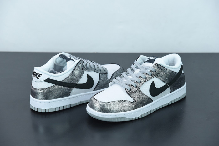 nike dunk low features silver cracked leather do5882-001
